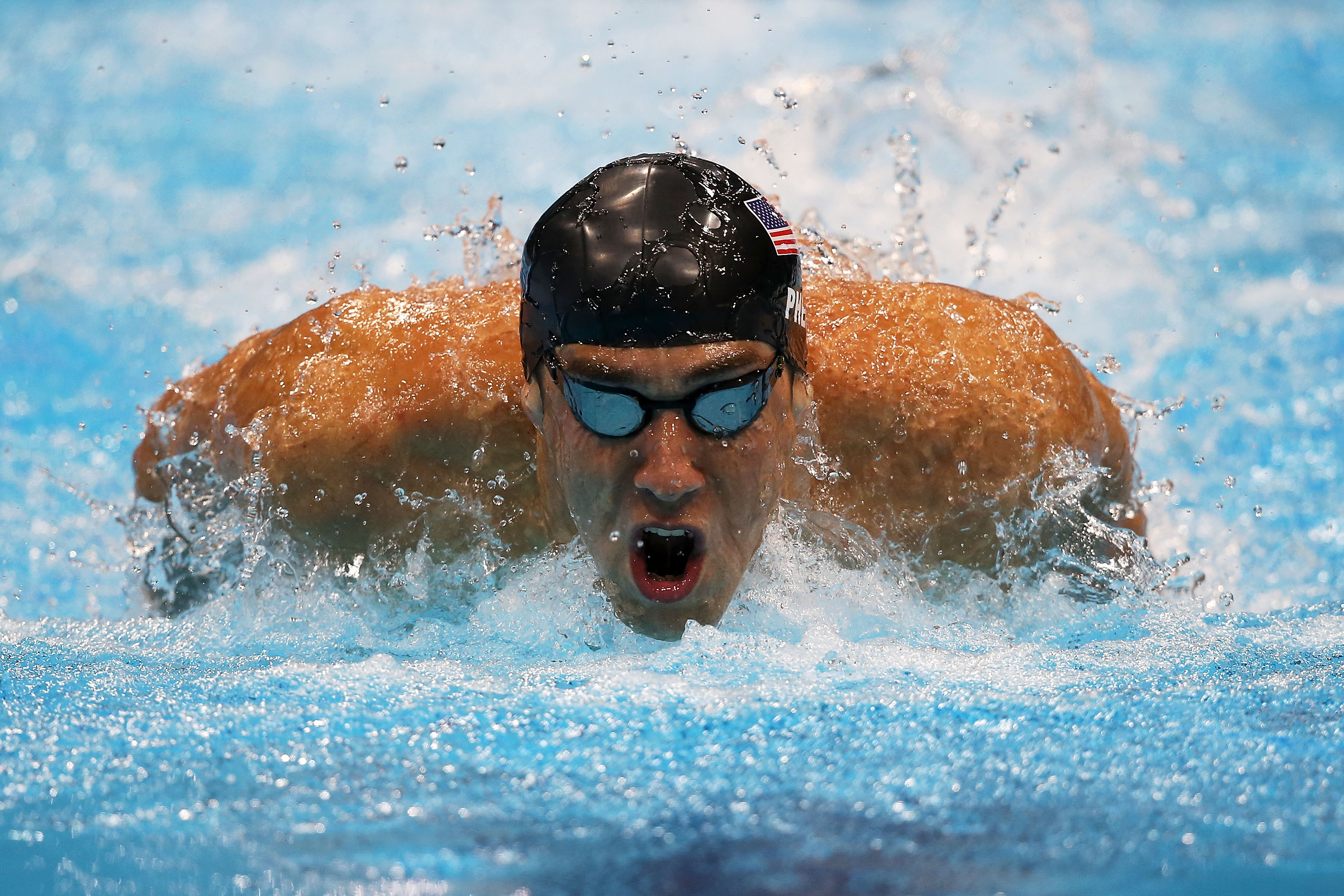 LONDON, ENGLAND - JULY 31: Michael Phelps of the United States competes in the Men's 200m Butterfly final on Day 4 of the London 2012 Olympic Games at the Aquatics Centre on July 31, 2012 in London, England. (Photo by Clive Rose/Getty Images)